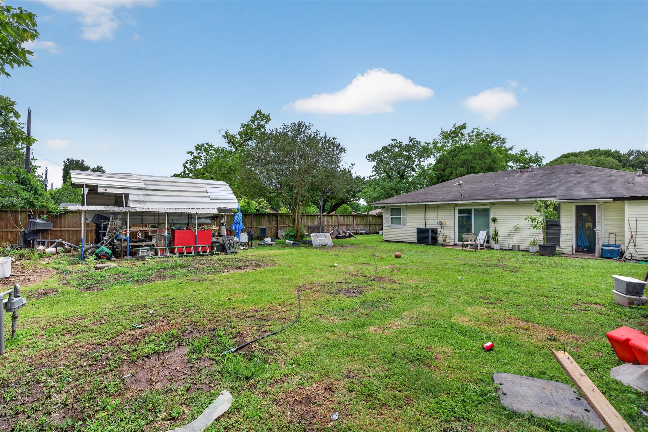 13919 Santa Teresa Road Houston, TX 77045 - Photo 17 of 22 Backyard with endless possibilities