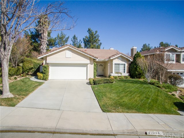 27014 Riversbridge Way Valencia, CA 91354 - Photo 1 of 1 a front view of a house with a garden