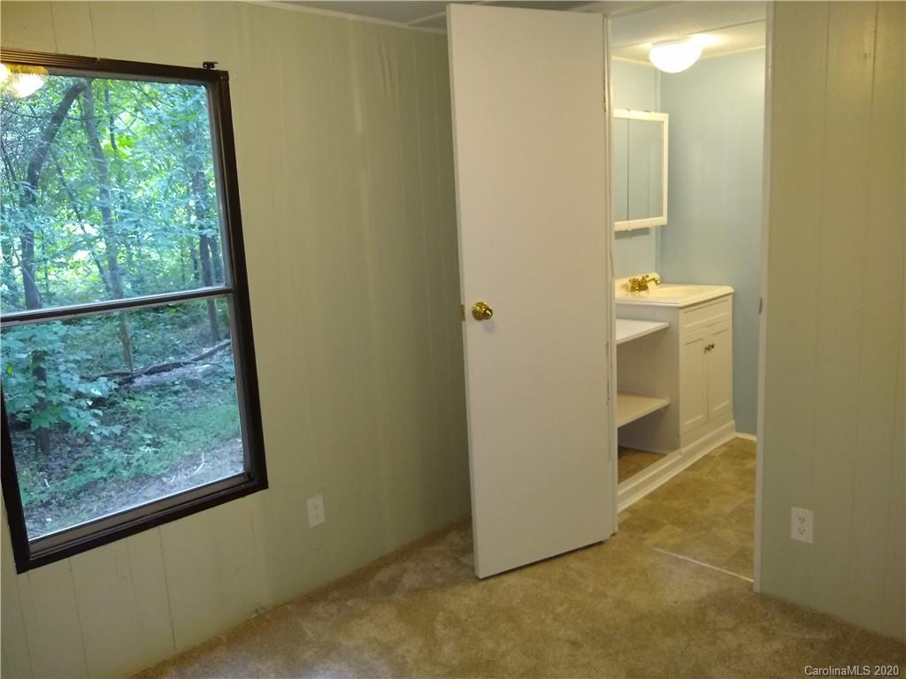 10116 Robert Bost Road Midland, NC 28107 - Photo 20 of 33 a view of a bathroom from a window