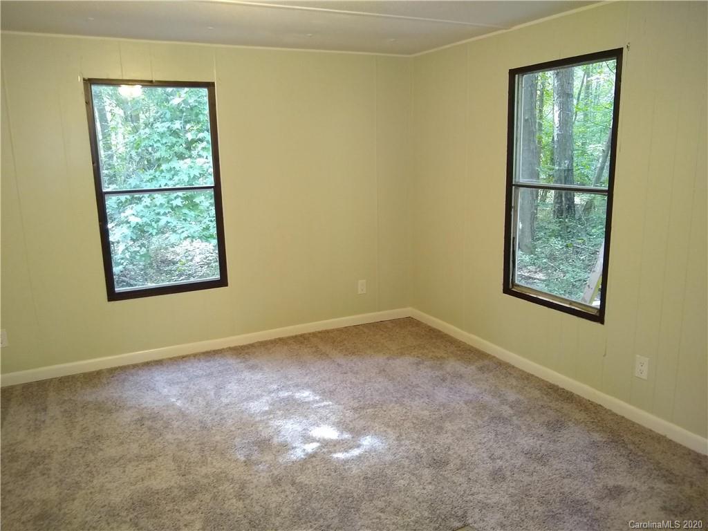 10116 Robert Bost Road Midland, NC 28107 - Photo 21 of 33 an empty room with a window