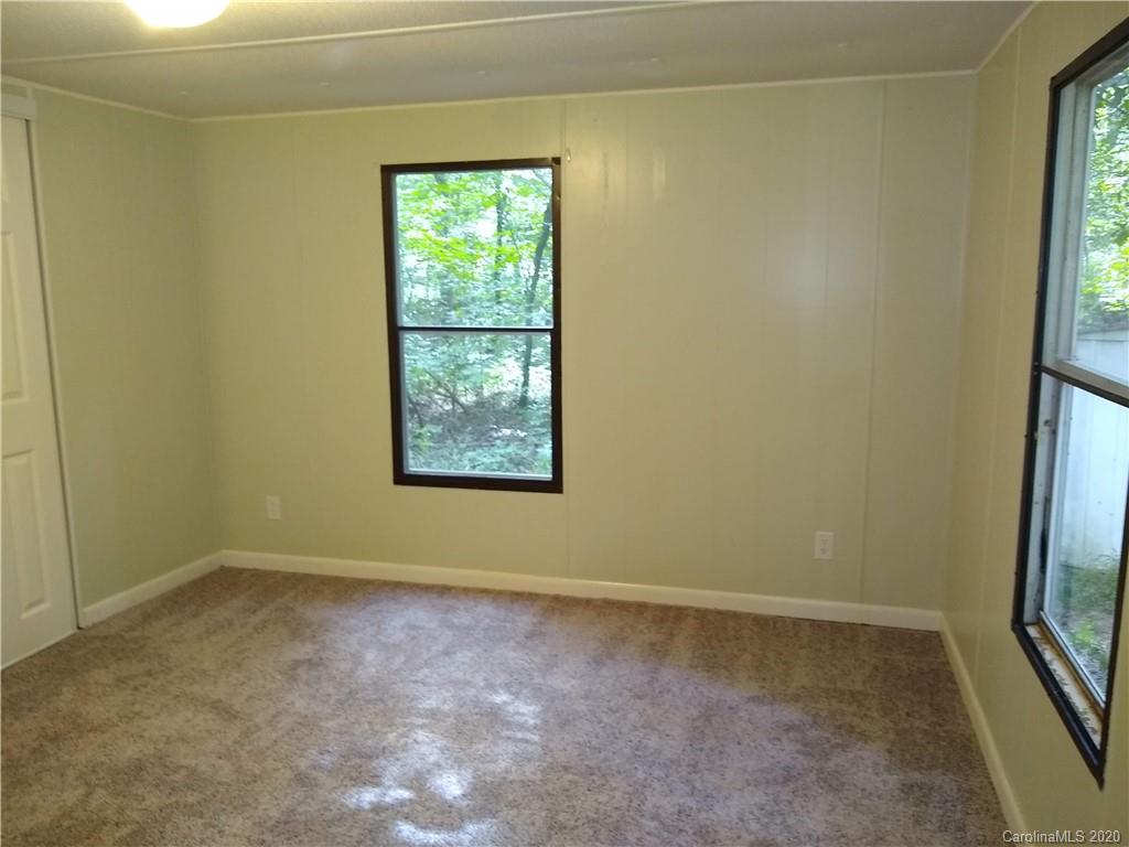 10116 Robert Bost Road Midland, NC 28107 - Photo 22 of 33 an empty room with windows