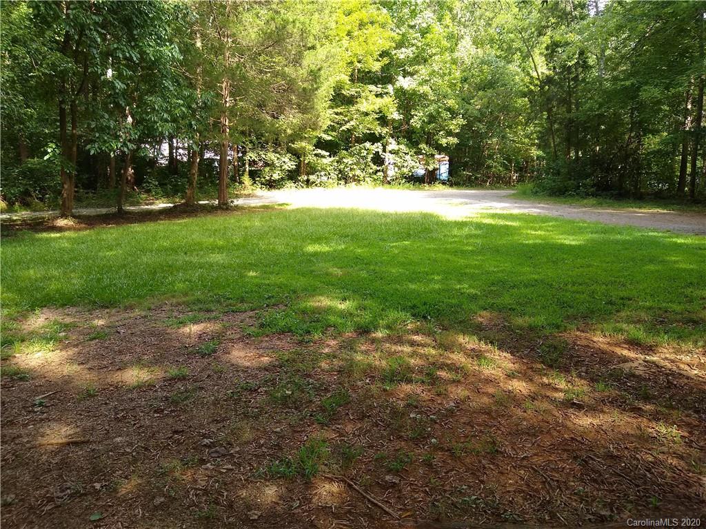 10116 Robert Bost Road Midland, NC 28107 - Photo 7 of 33 a view of grassy field with trees