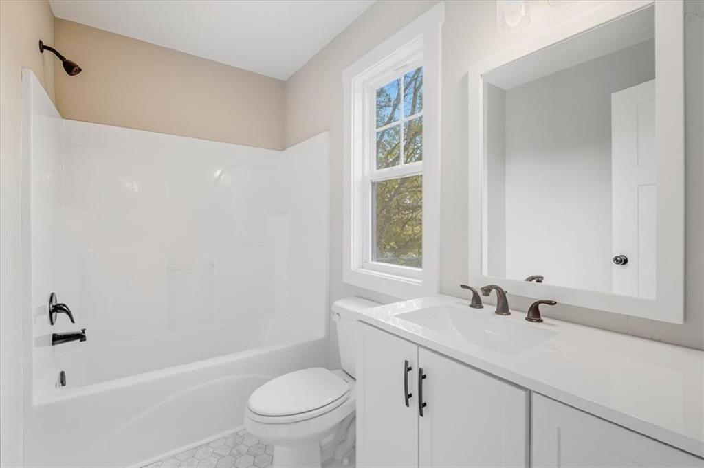 100 Hixville Road Aragon, GA 30104 - Photo 15 of 26 a bathroom with a sink a toilet and shower