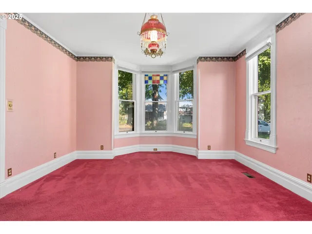 a en suite bathroom with a sink a mirror and a shower