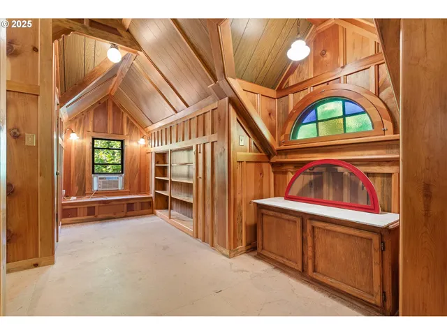 a bathroom with a sink a vanity and a mirror