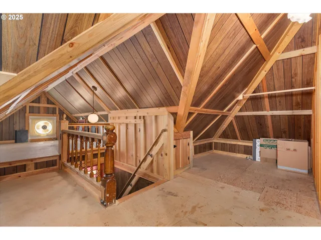 a living room with lots of gym equipment