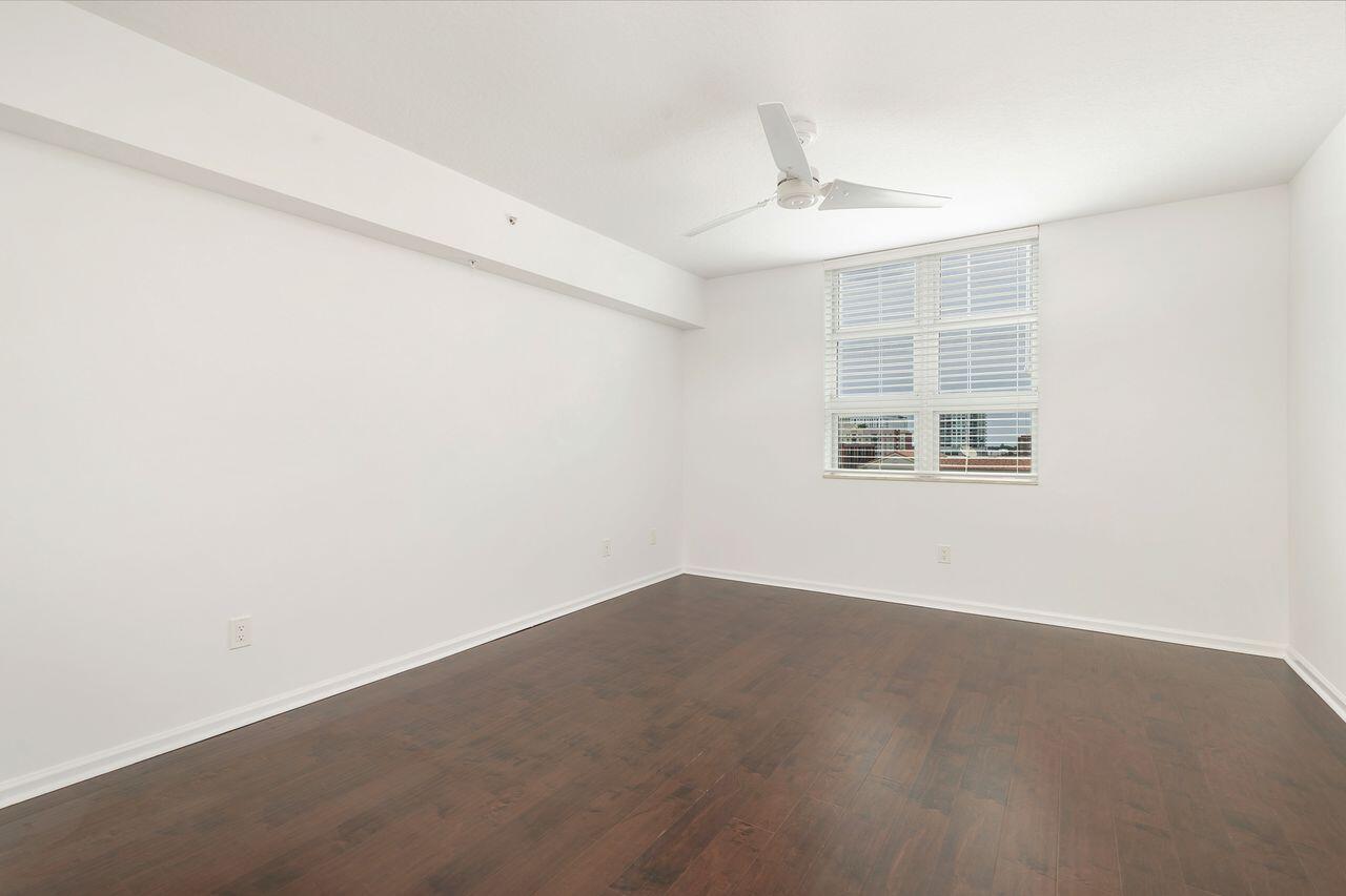 403 South Sapodilla Avenue, Unit 509 West Palm Beach, FL 33401 - Photo 12 of 42 an empty room with windows and closet