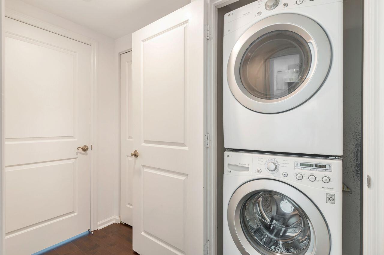 403 South Sapodilla Avenue, Unit 509 West Palm Beach, FL 33401 - Photo 20 of 42 a view of a hallway with washer and dryer