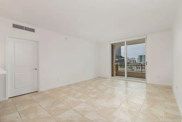 an empty room with natural light