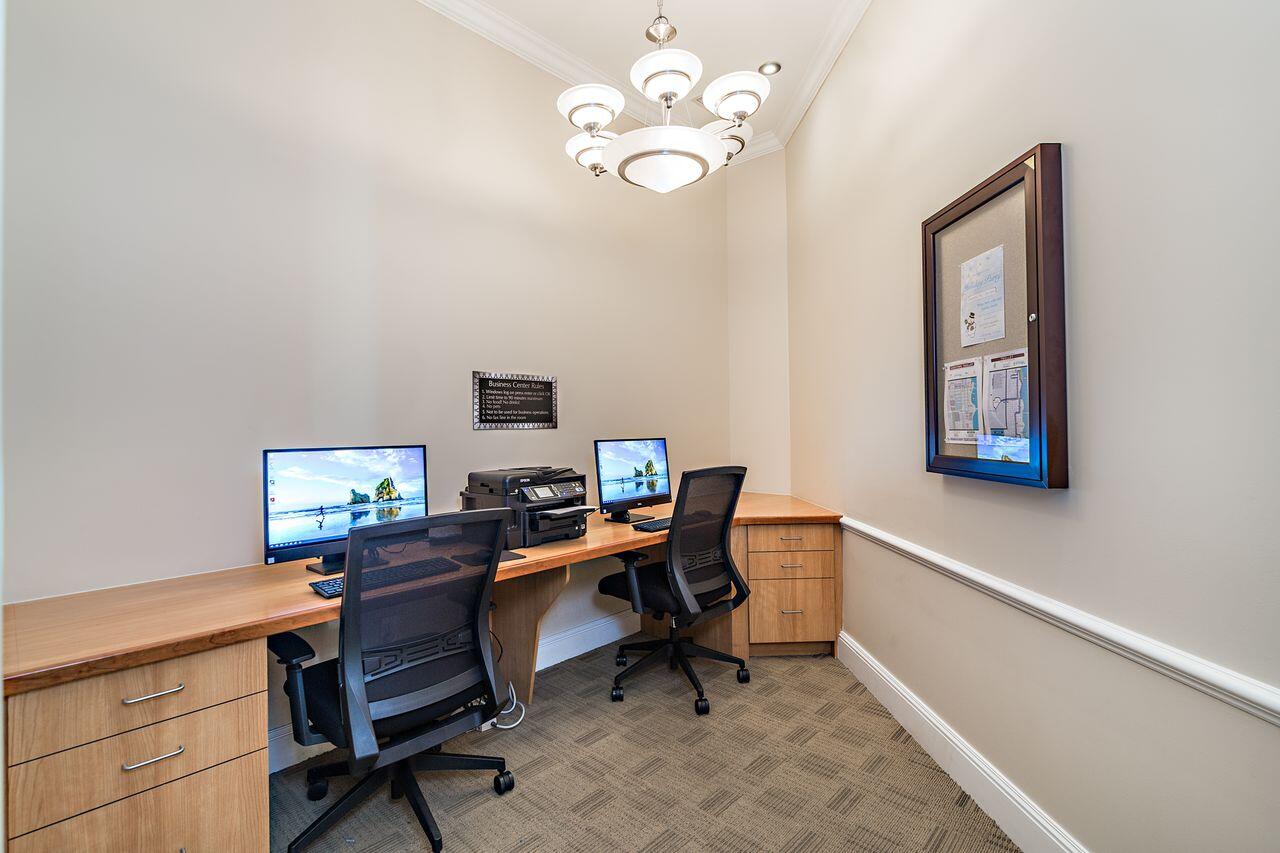 403 South Sapodilla Avenue, Unit 509 West Palm Beach, FL 33401 - Photo 32 of 42 a workspace with wooden floor and a window