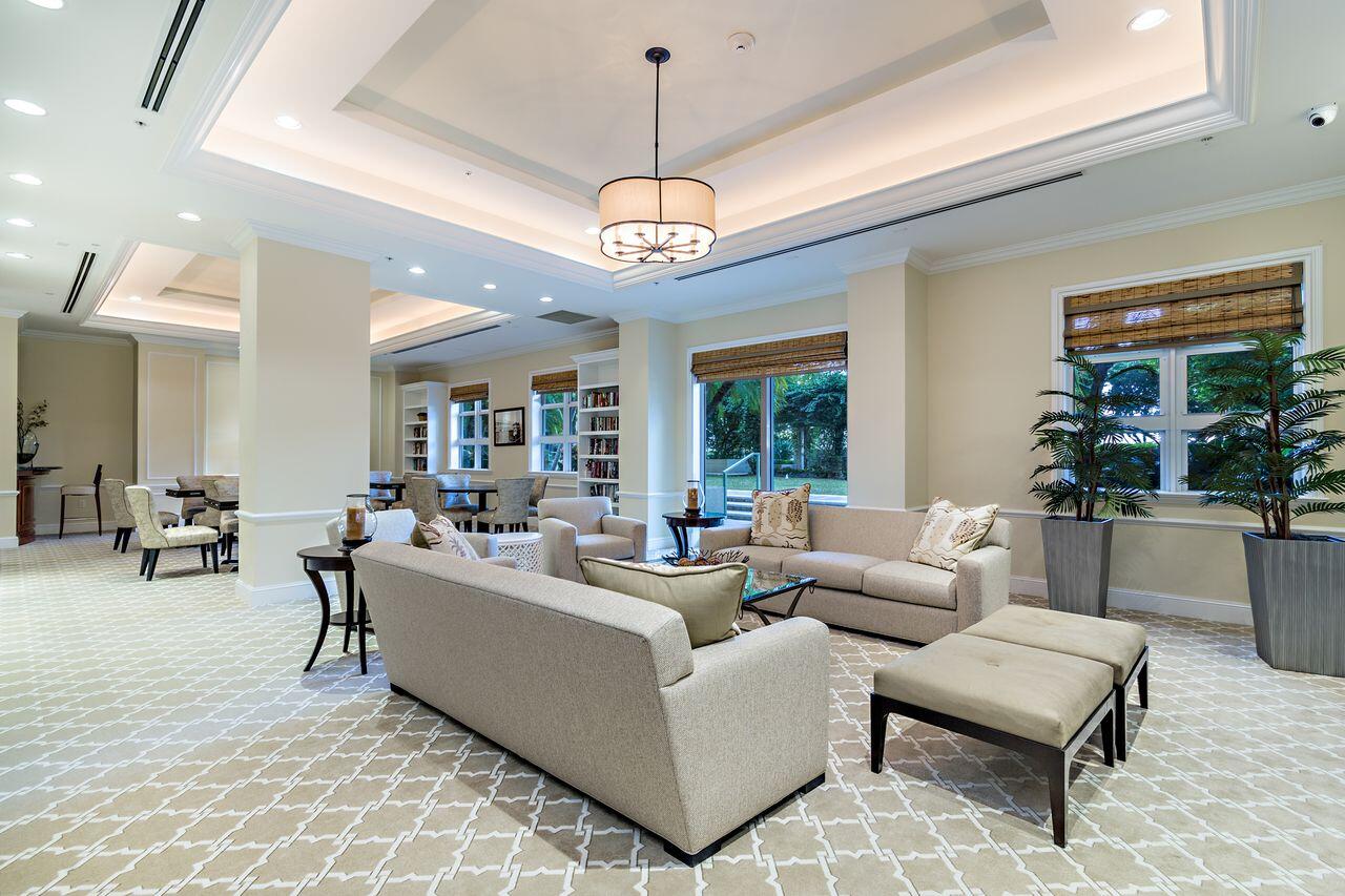 403 South Sapodilla Avenue, Unit 509 West Palm Beach, FL 33401 - Photo 33 of 42 a living room with furniture and a chandelier