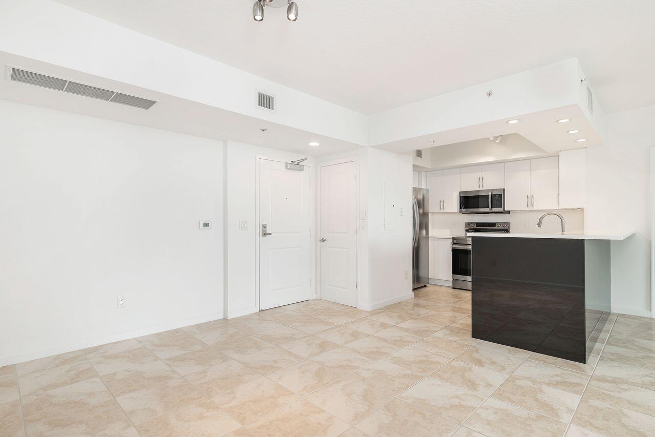 403 South Sapodilla Avenue, Unit 509 West Palm Beach, FL 33401 - Photo 6 of 42 a view of kitchen with wooden floor