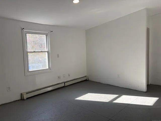 an empty room with a window