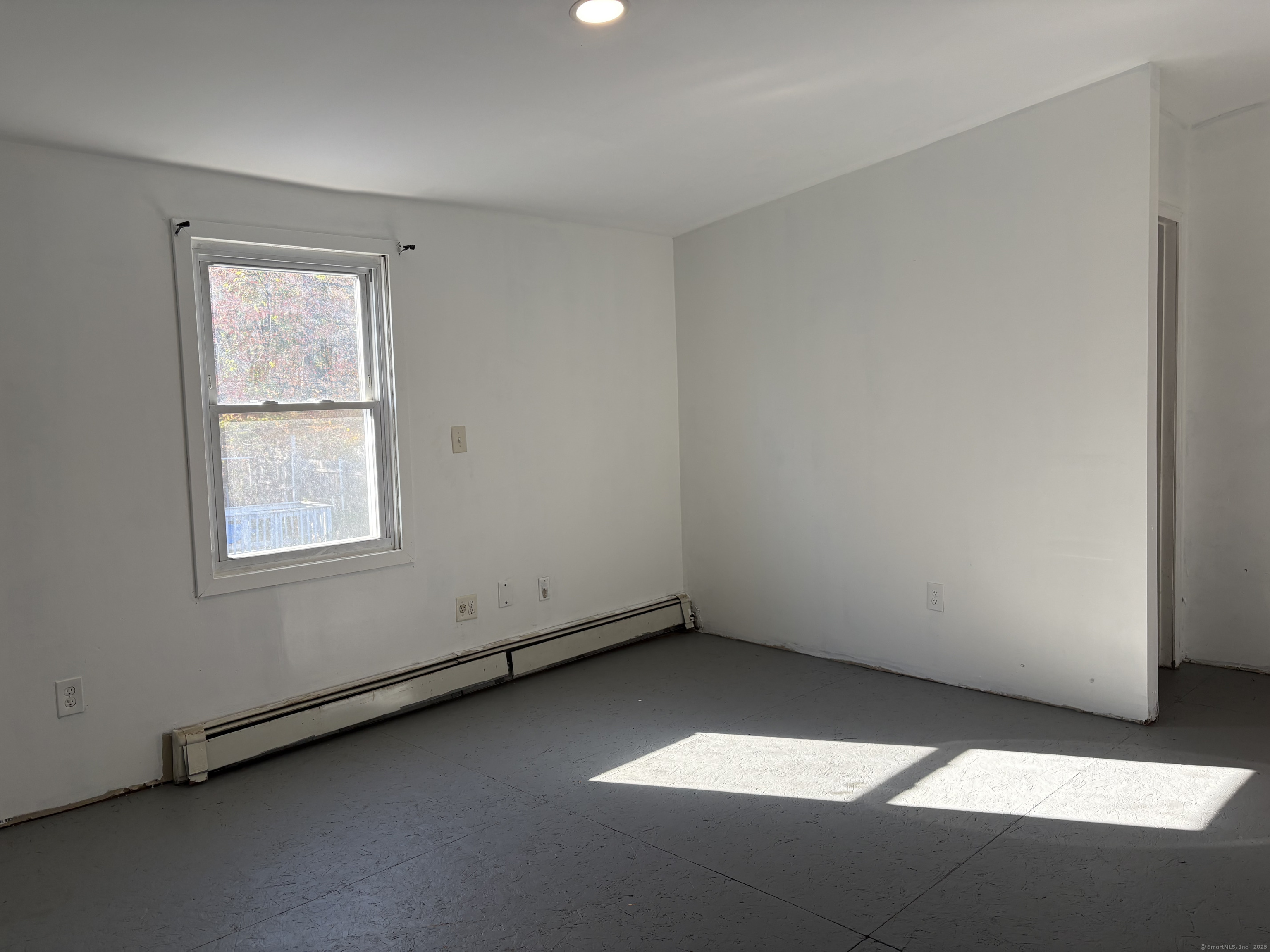 Undisclosed Address West Haven, CT 06516 - Photo 10 of 16 an empty room with a window