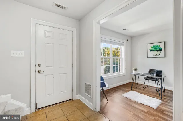 a view of a livingroom with furniture and window