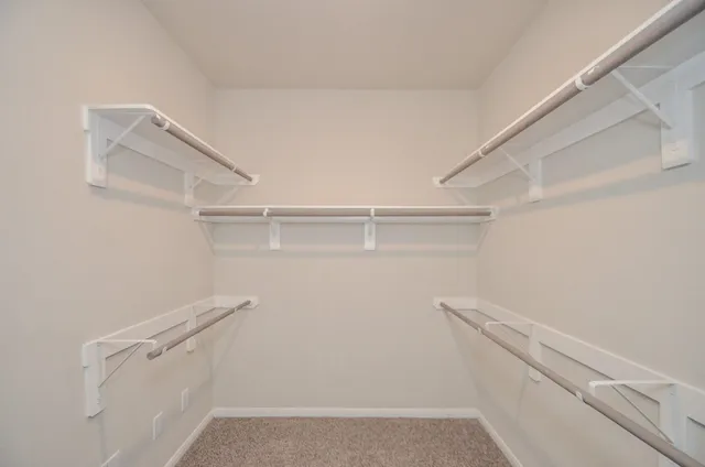 a view of an empty walk in closet