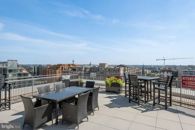 a view of a terrace with furniture and stove