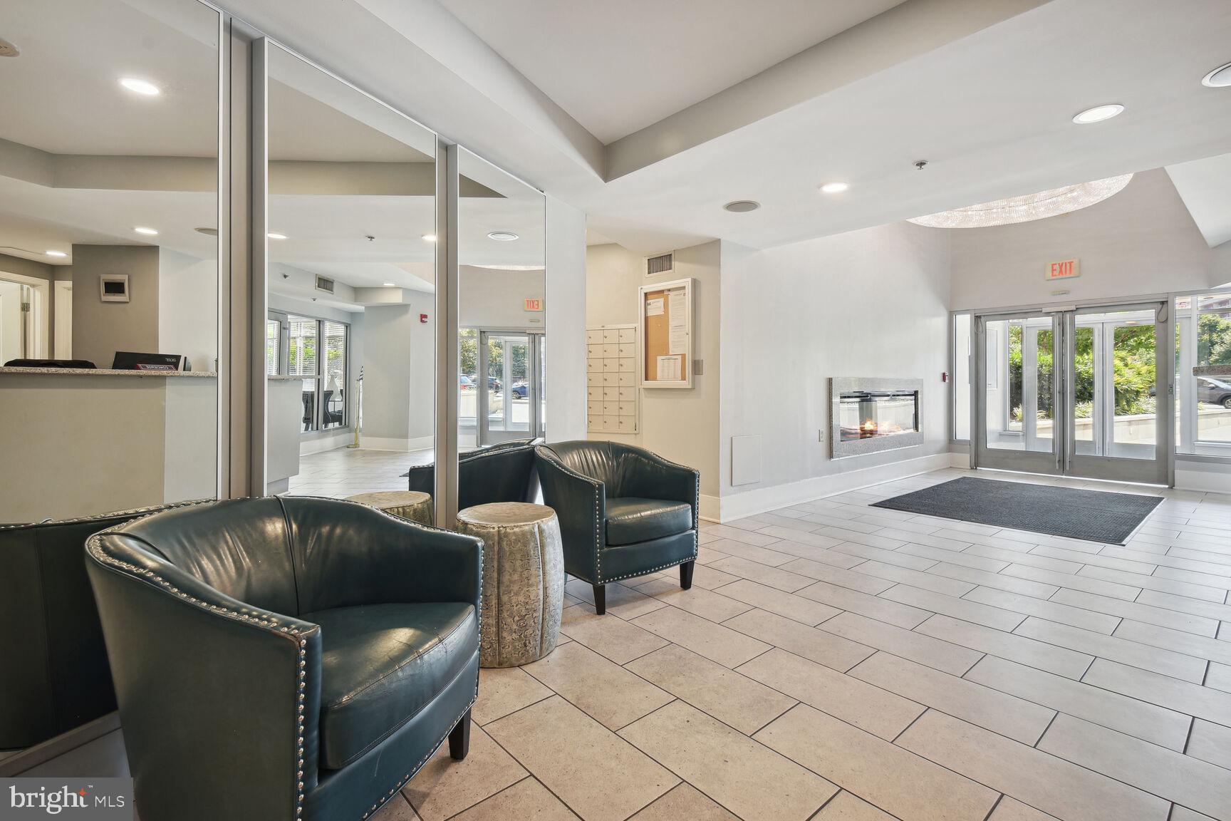 555 Massachusetts Avenue Northwest, Unit 901 Washington, DC 20001 - Photo 46 of 50 a living room with furniture and a couch