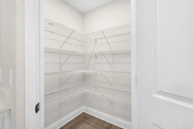 a view of a room with racks on the wall