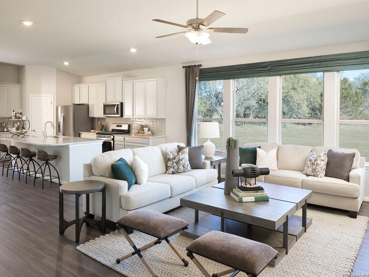 2802 Clemente Way Converse, TX 78109 - Photo 2 of 7 a living room with furniture kitchen view and a large window
