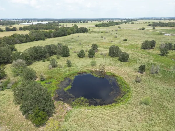 a view of a lake with an outdoor space