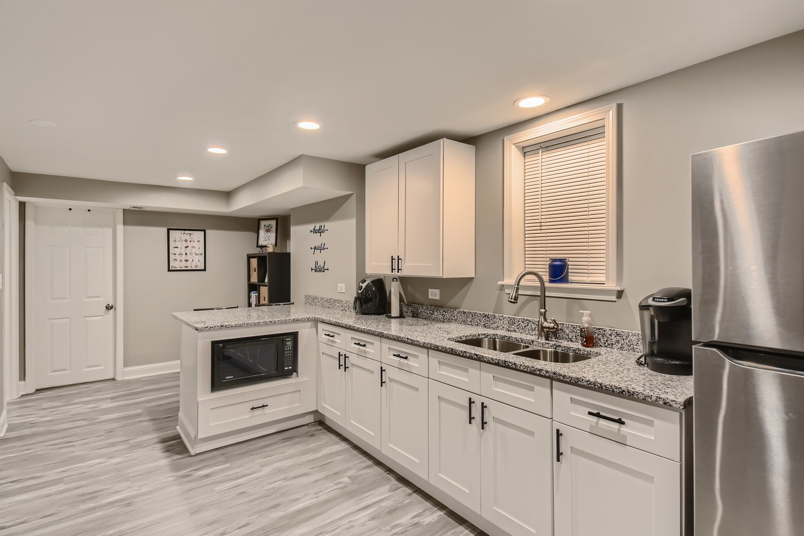 19420 Wolf Road Mokena, IL 60448 - Photo 14 of 32 a kitchen with a refrigerator sink and cabinets