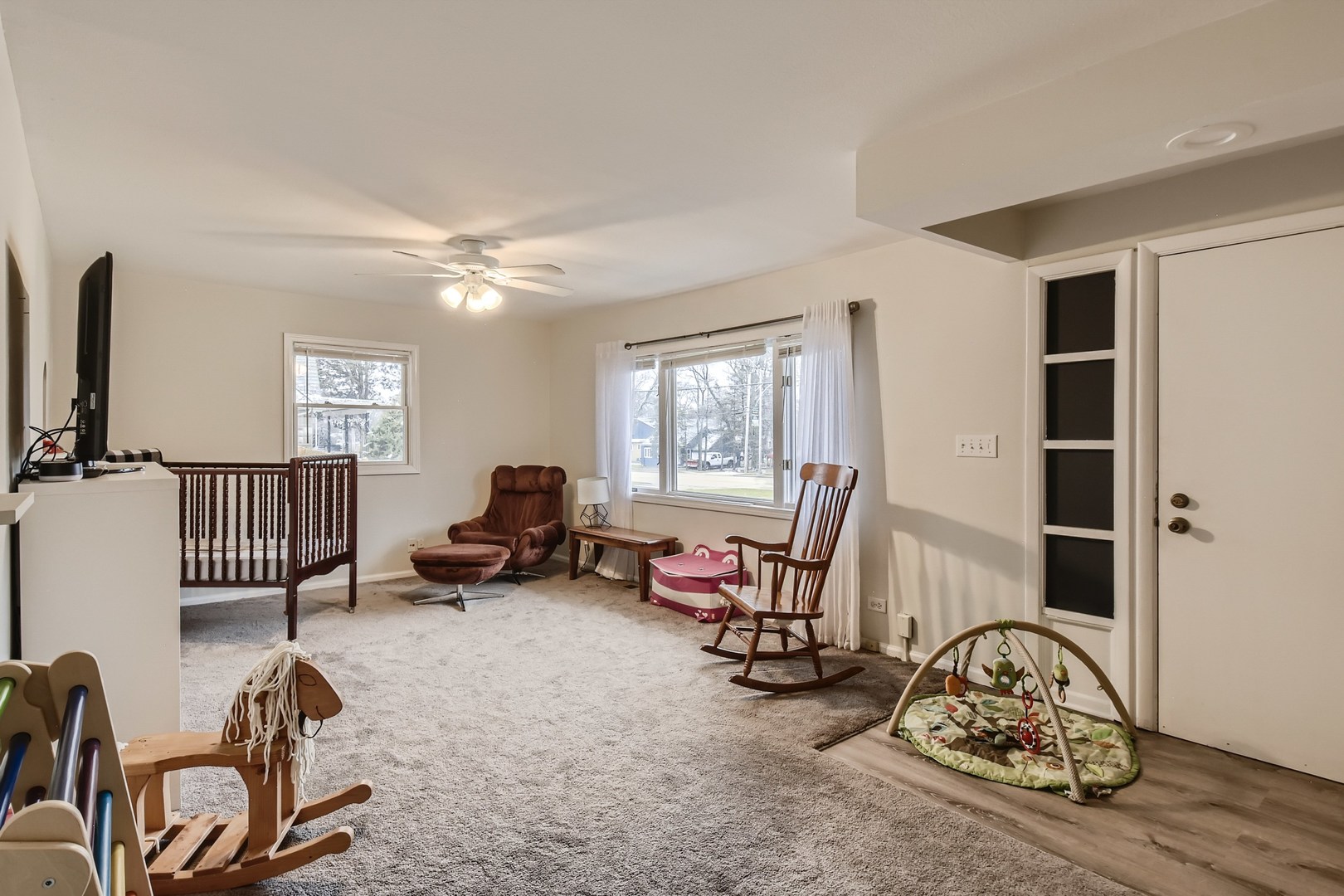 19420 Wolf Road Mokena, IL 60448 - Photo 16 of 32 a living room with furniture a couch and large window