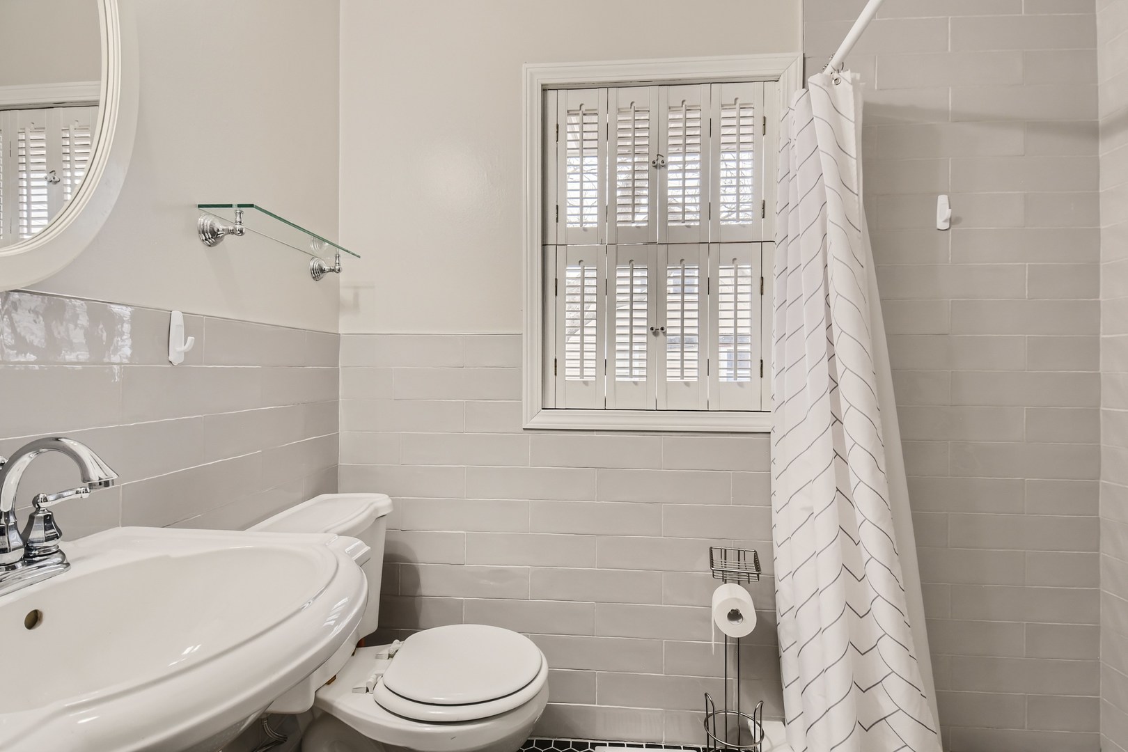19420 Wolf Road Mokena, IL 60448 - Photo 19 of 32 a white toilet sitting next to a bathroom sink