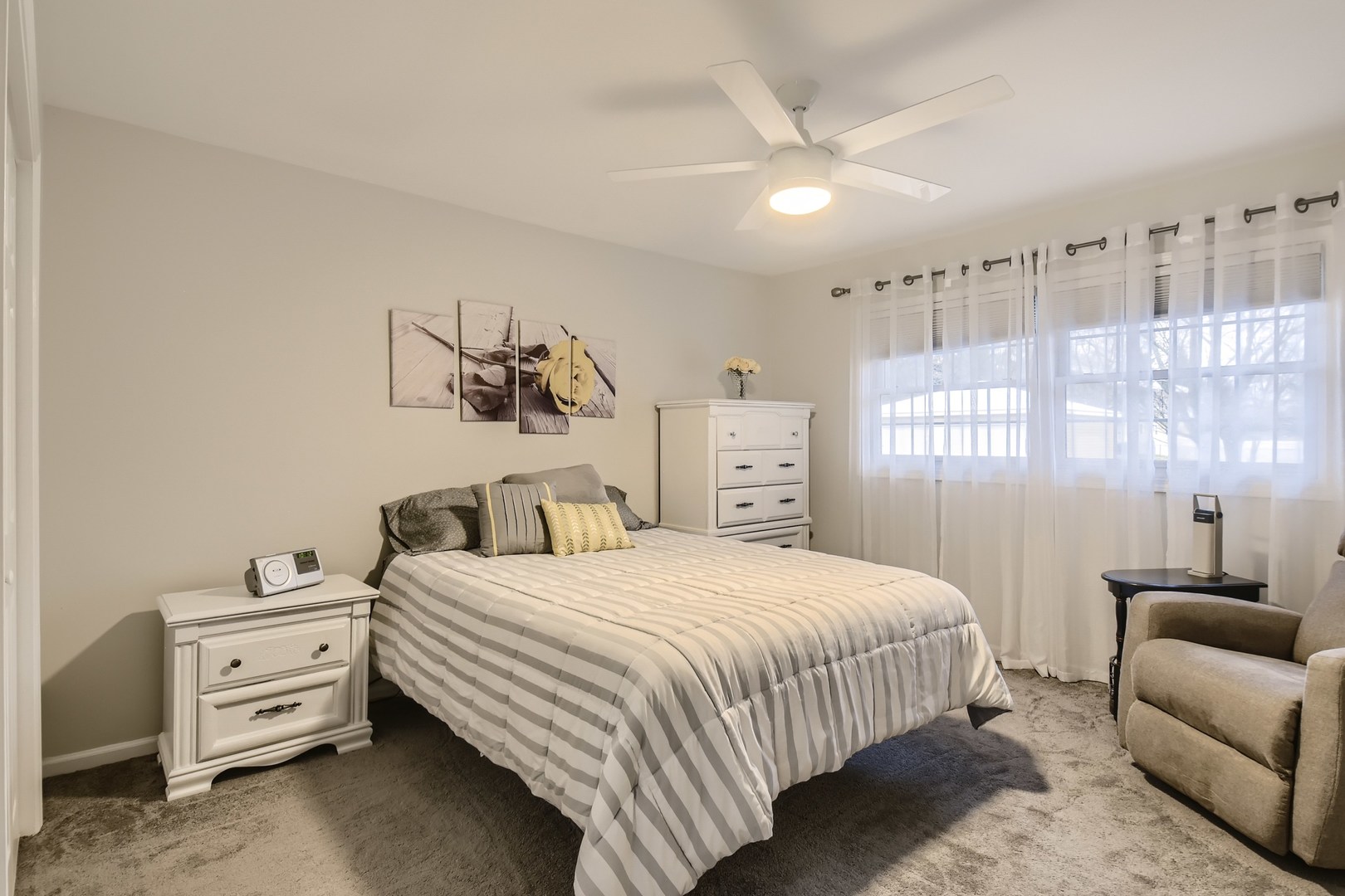 19420 Wolf Road Mokena, IL 60448 - Photo 20 of 32 a bedroom with a bed and a couch