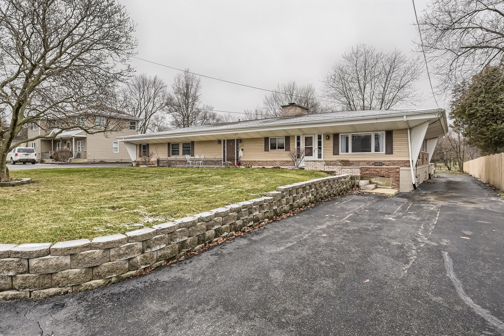 19420 Wolf Road Mokena, IL 60448 - Photo 2 of 32 a front view of a house with a yard