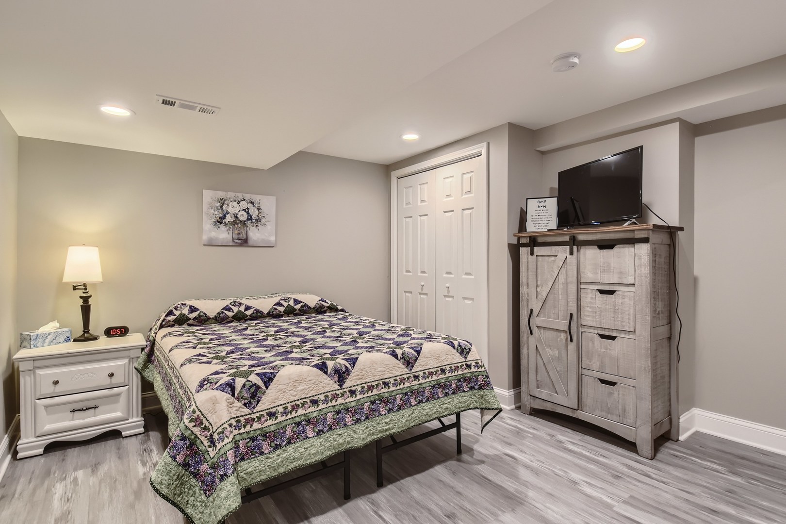 19420 Wolf Road Mokena, IL 60448 - Photo 24 of 32 a bedroom with a bed and a flat screen tv