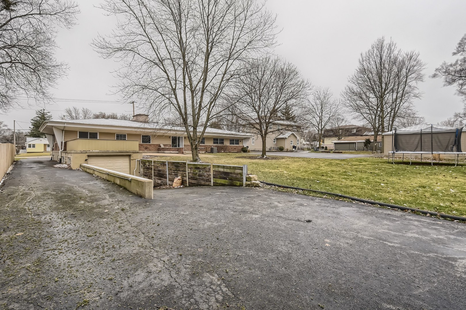 19420 Wolf Road Mokena, IL 60448 - Photo 29 of 32 a view of a yard with a large tree