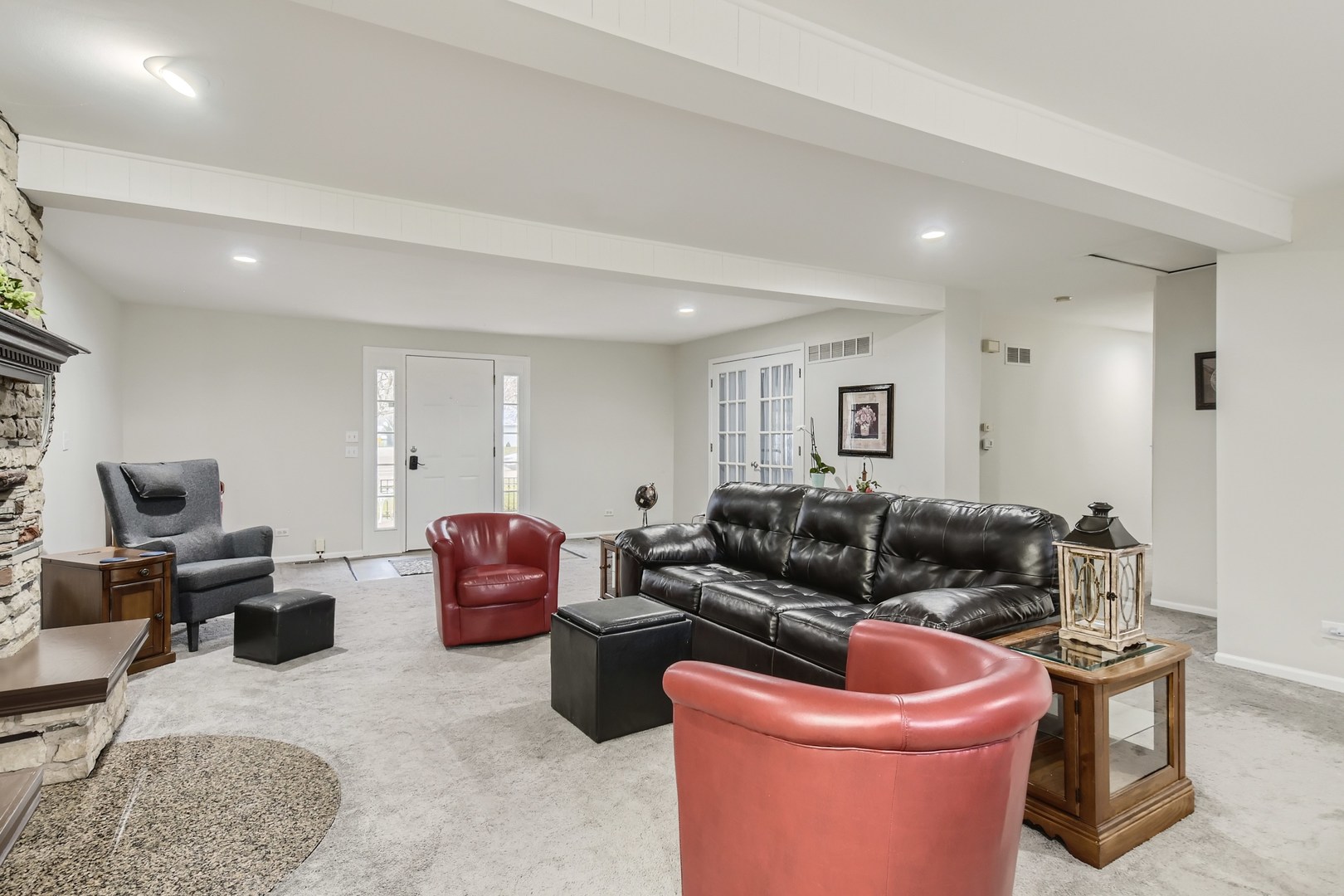 19420 Wolf Road Mokena, IL 60448 - Photo 7 of 32 a living room with furniture a couch and a flat screen tv