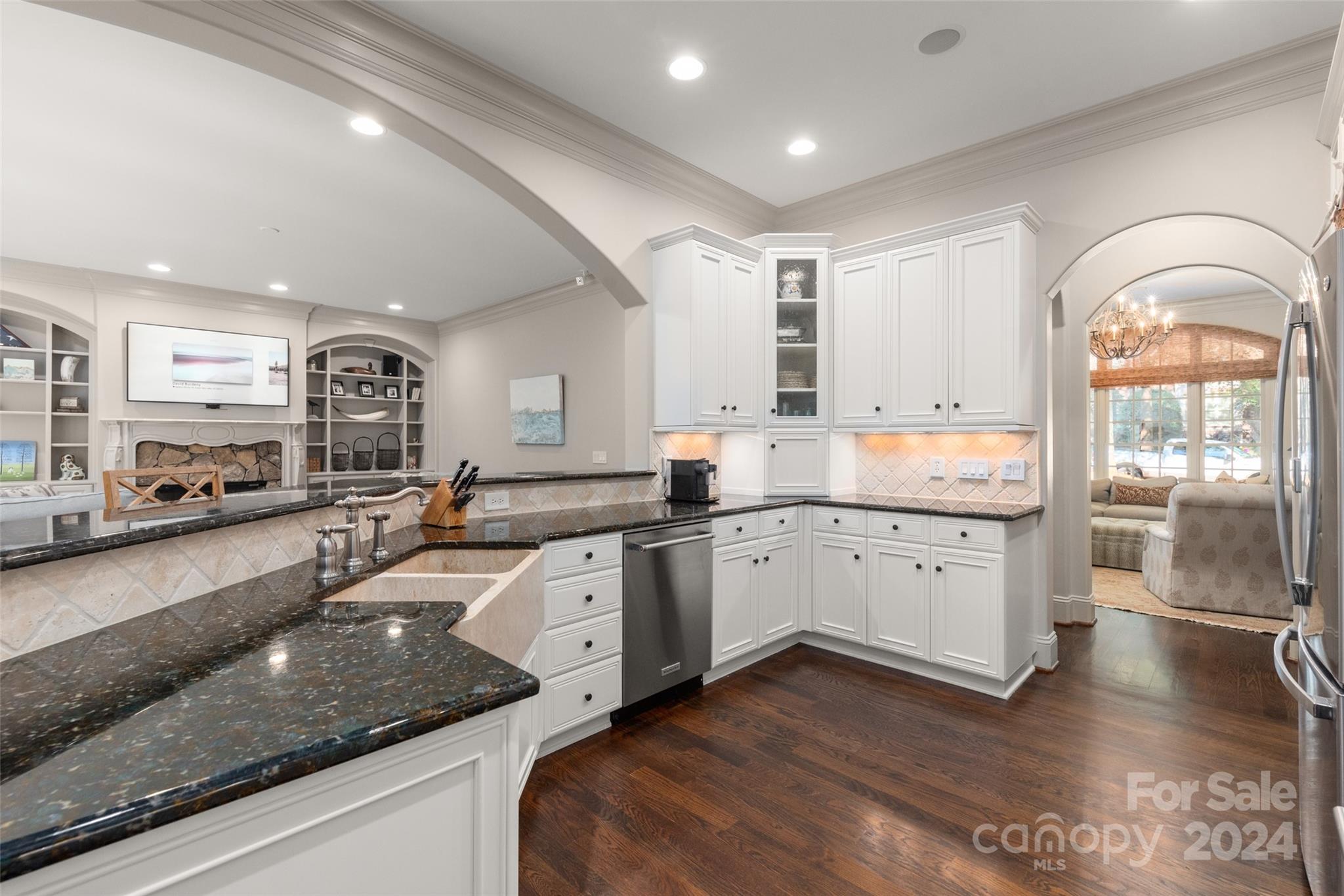 8432 Highgrove Street Charlotte, NC 28277 - Photo 20 of 46 a large kitchen with stainless steel appliances granite countertop a lot of counter space and a sink