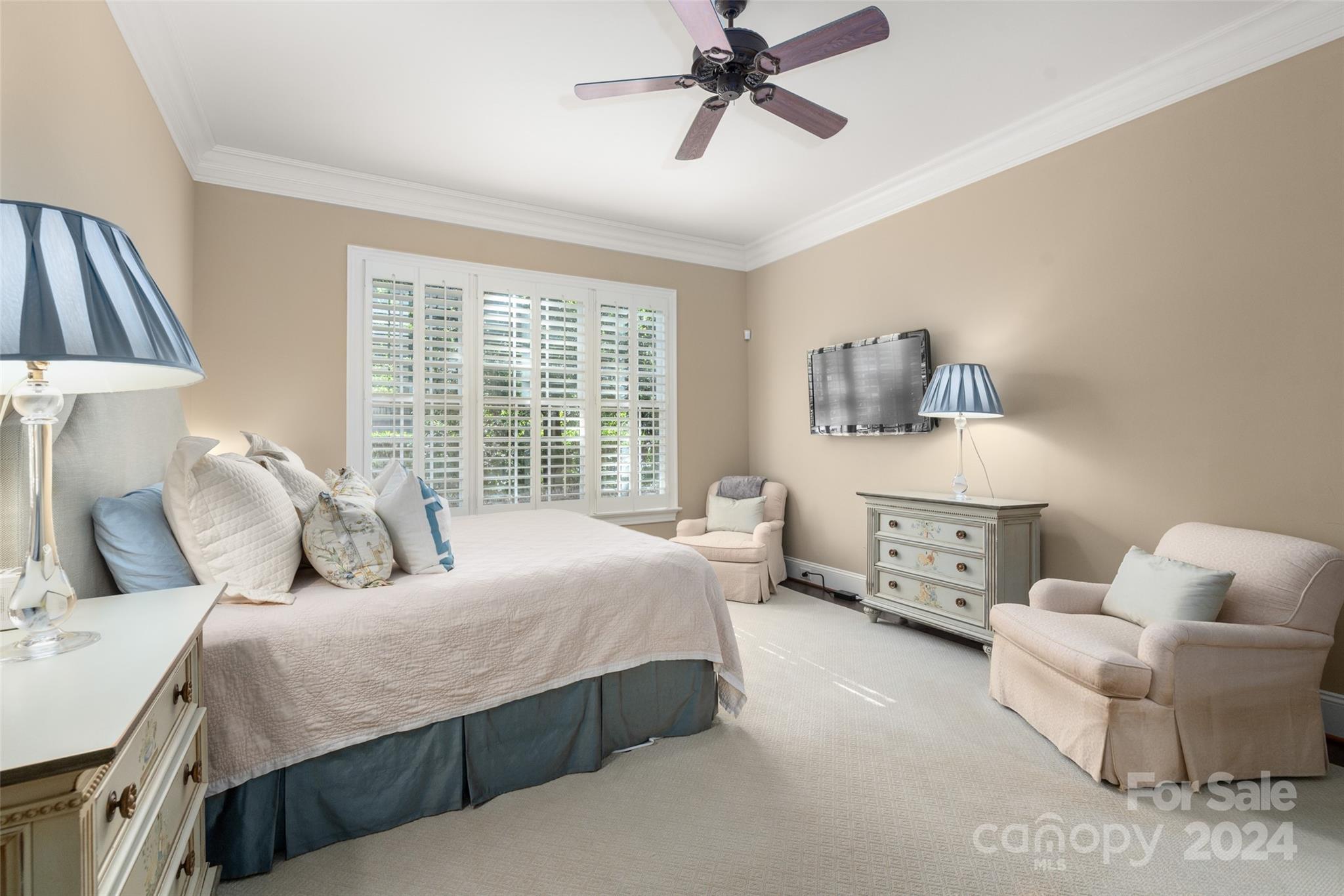 8432 Highgrove Street Charlotte, NC 28277 - Photo 23 of 46 a bedroom with a bed and a couch