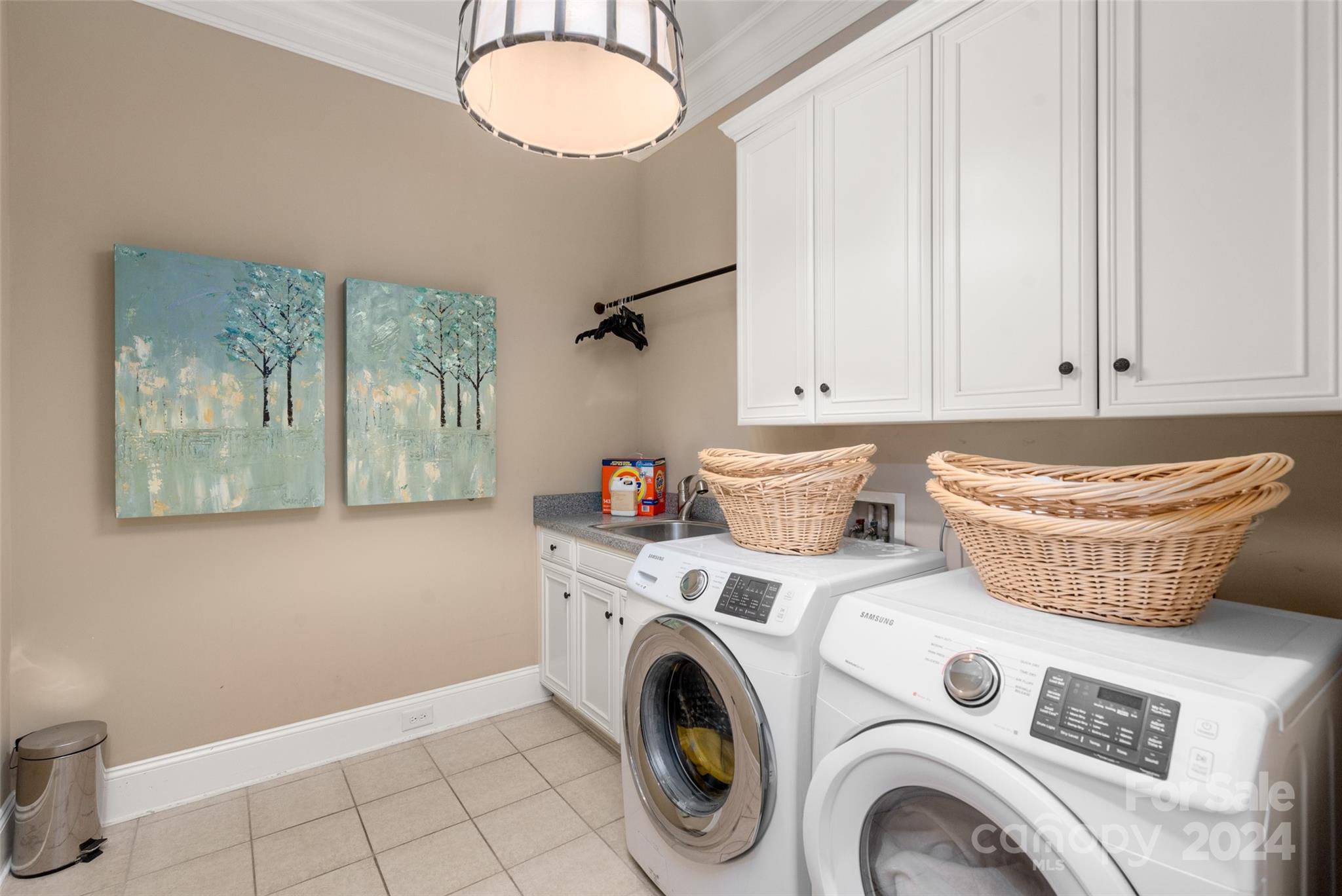 8432 Highgrove Street Charlotte, NC 28277 - Photo 27 of 46 a view of storage and utility room with washer and dryer