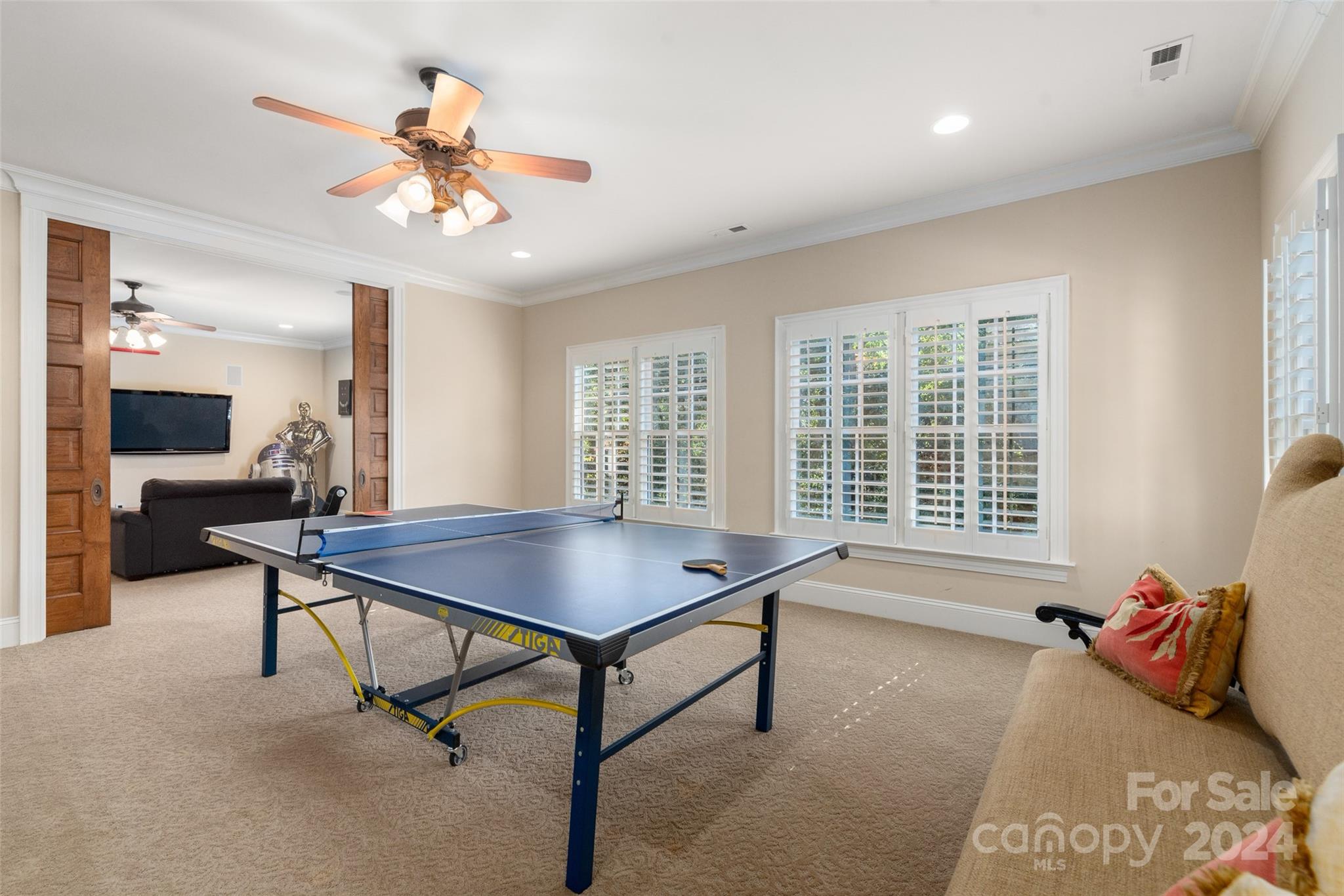 8432 Highgrove Street Charlotte, NC 28277 - Photo 29 of 46 a living room with furniture pool table and a window