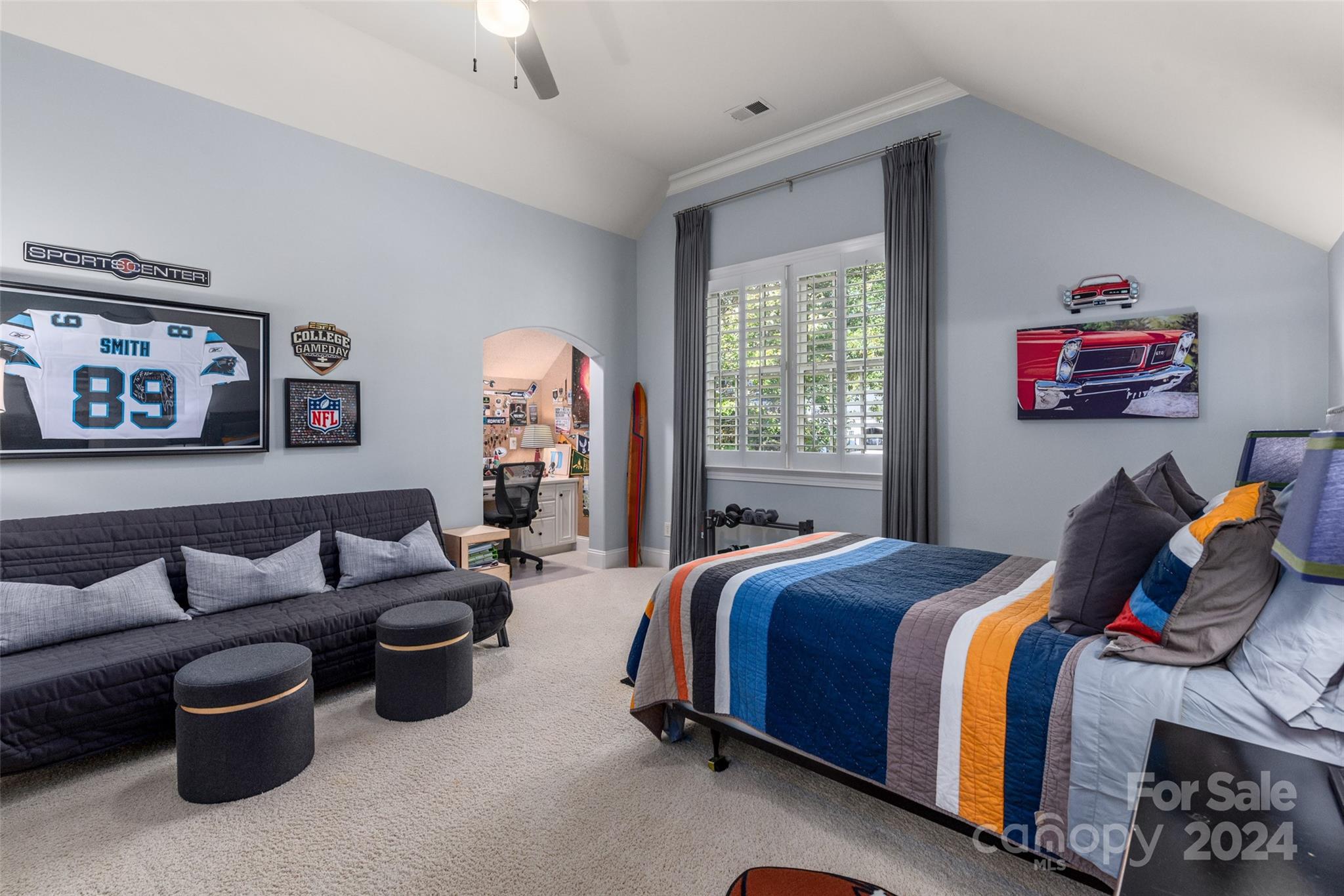 8432 Highgrove Street Charlotte, NC 28277 - Photo 34 of 46 a bedroom with bed couch and window