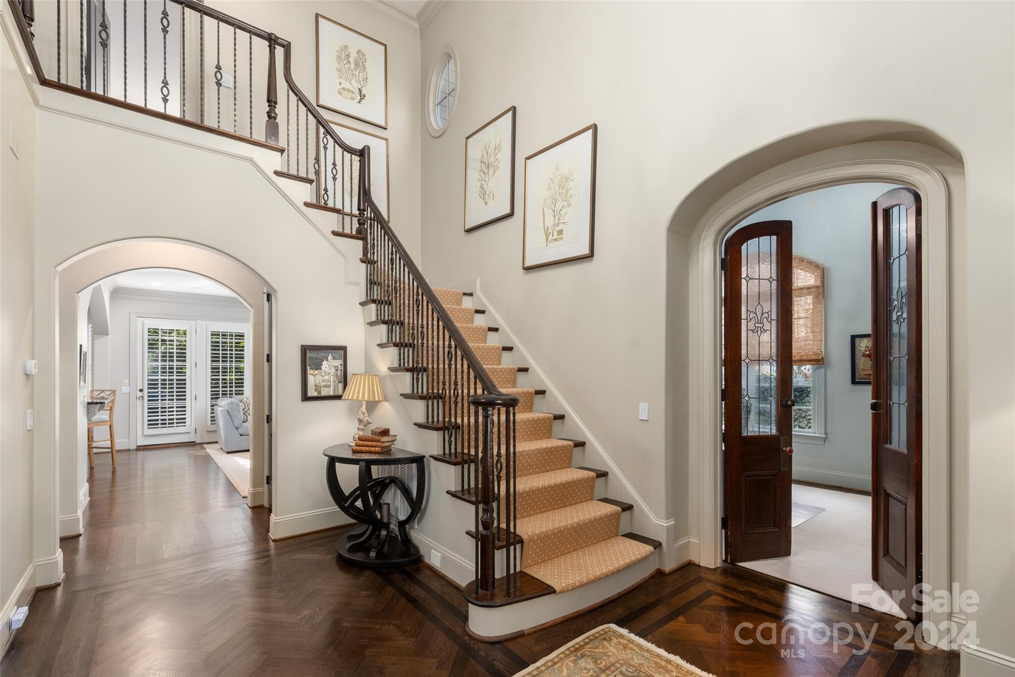 8432 Highgrove Street Charlotte, NC 28277 - Photo 6 of 46 a view of entryway and hall with wooden floor