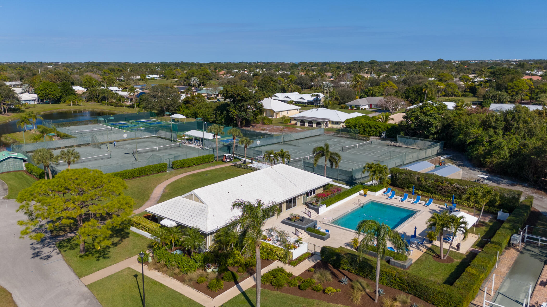 2918 Southeast Fairway West, Unit 13 Stuart, FL 34997 - Photo 30 of 34 a view of a city with lawn chairs