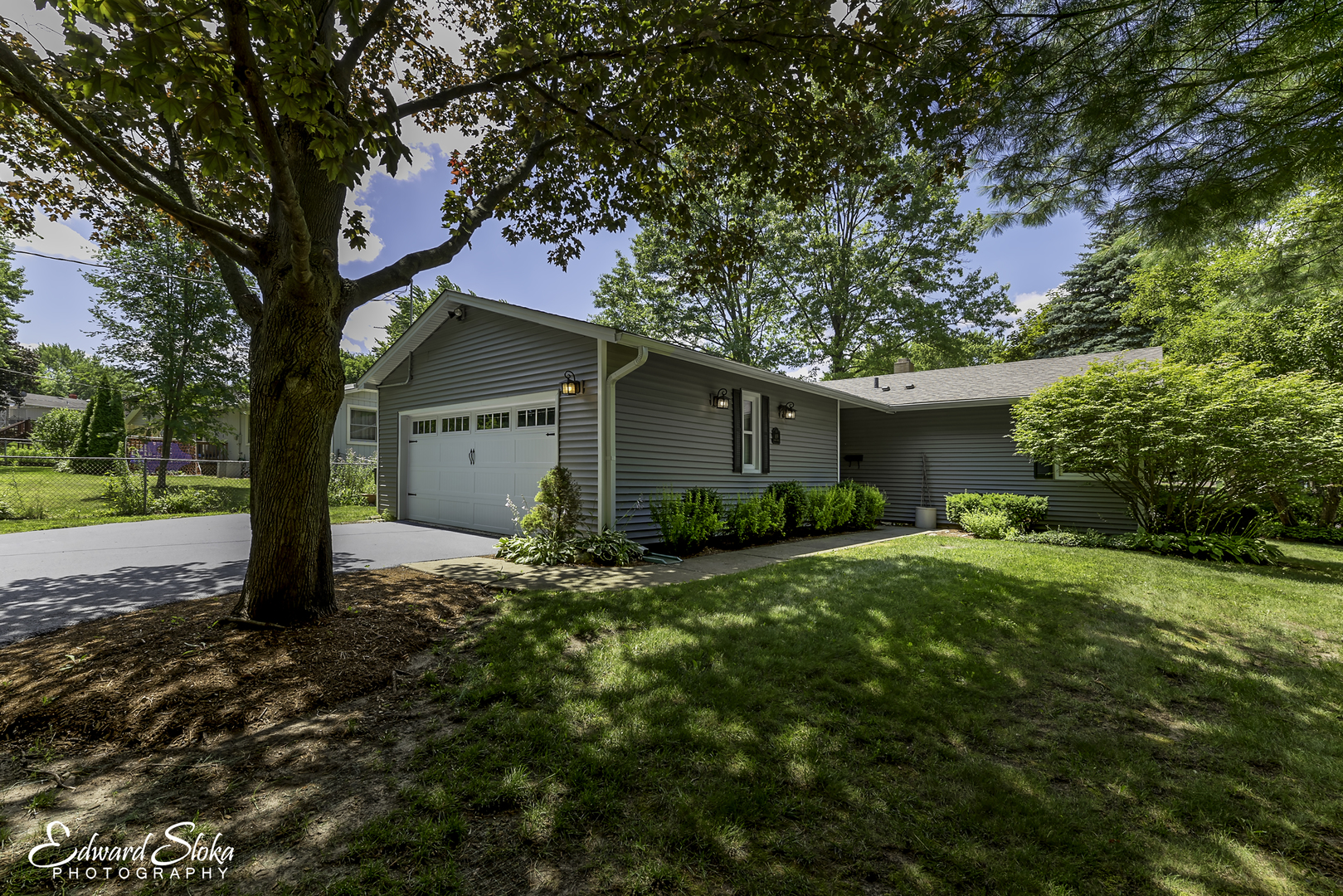 659 Alida Drive Cary, IL 60013 - Photo 1 of 33 a view of a house with yard and tree s