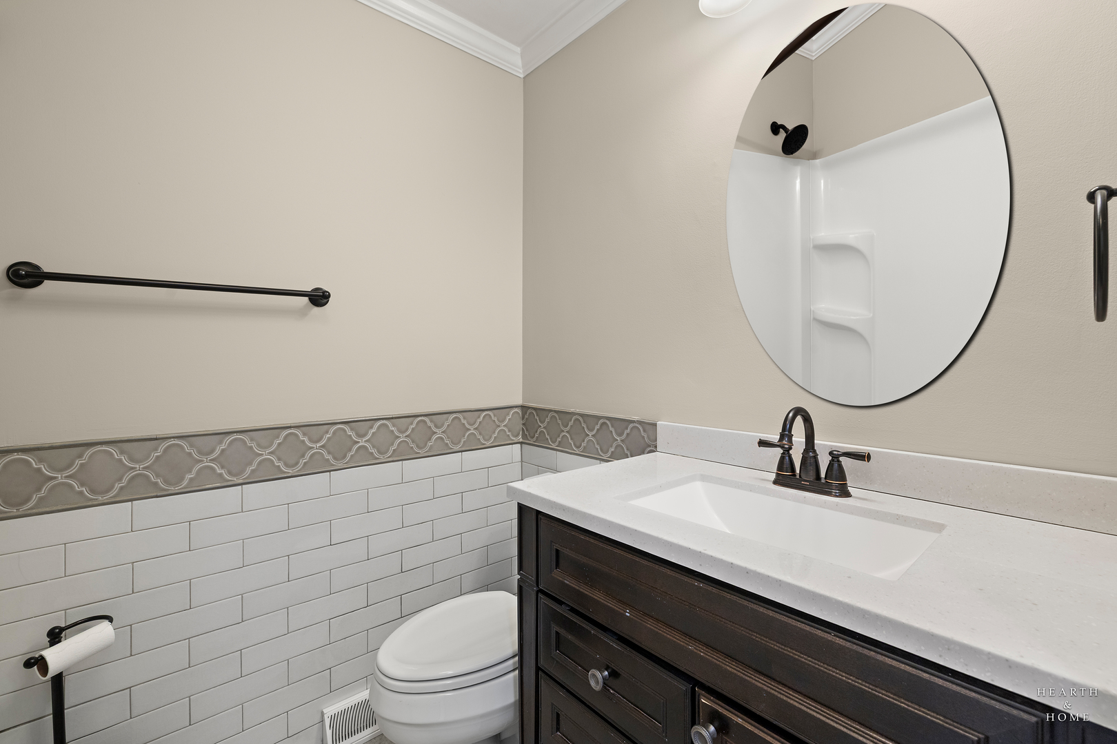 659 Alida Drive Cary, IL 60013 - Photo 21 of 33 a bathroom with a sink a toilet and a mirror