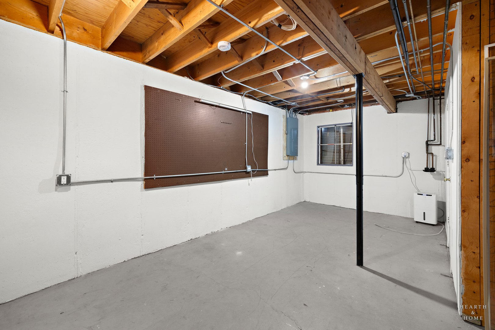 659 Alida Drive Cary, IL 60013 - Photo 28 of 33 a view of livingroom with wooden floor and flat screen tv