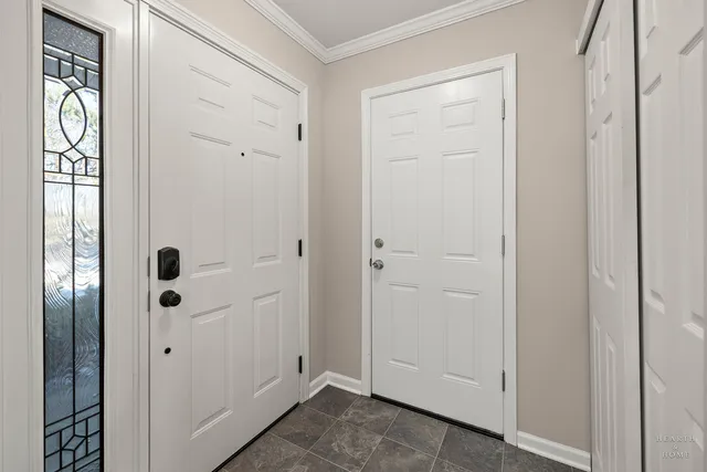 a view of a hallway with closet area
