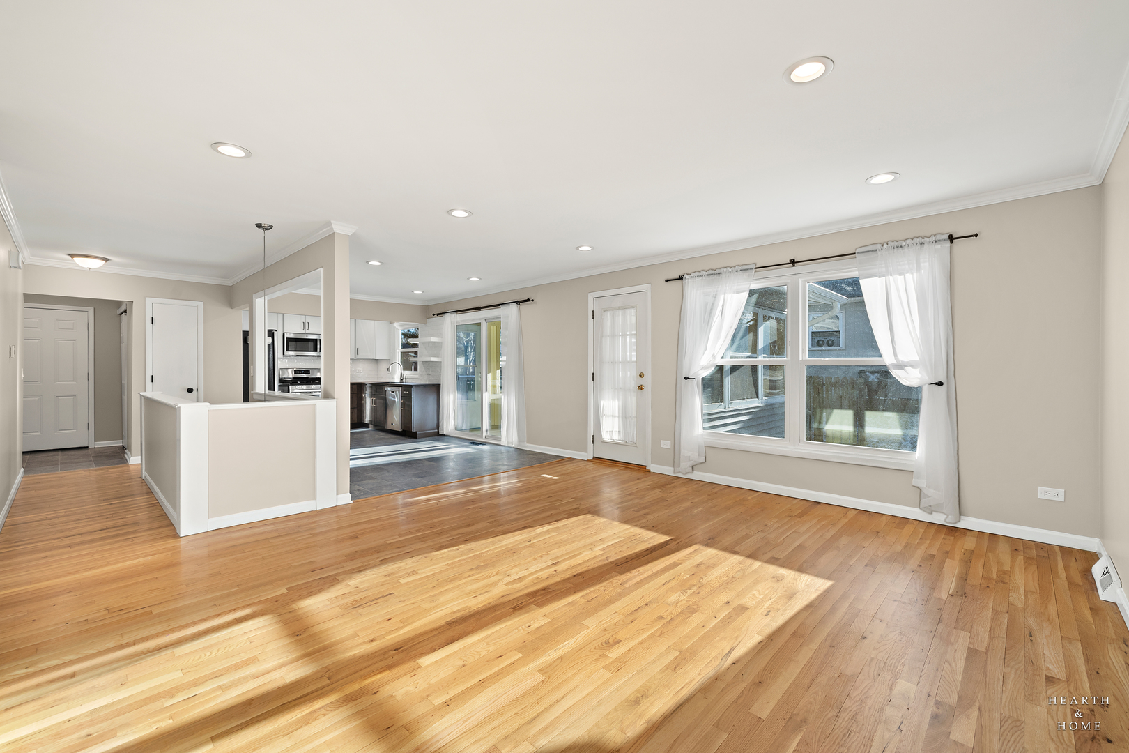 659 Alida Drive Cary, IL 60013 - Photo 5 of 33 a view of kitchen with furniture and wooden floor
