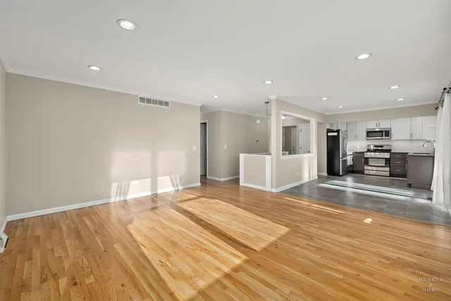a view of a kitchen with a sink