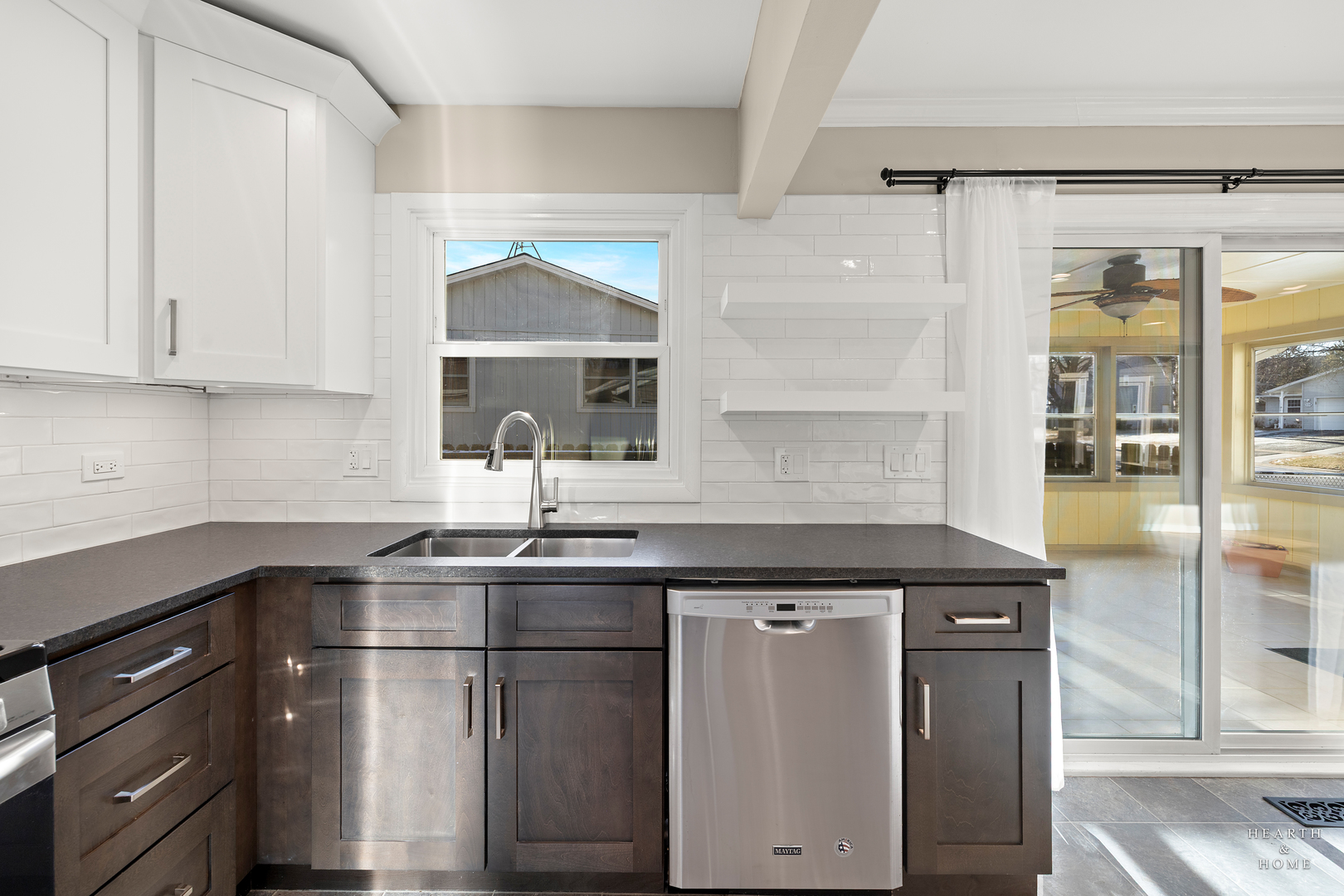 659 Alida Drive Cary, IL 60013 - Photo 10 of 33 a kitchen with a sink and cabinets