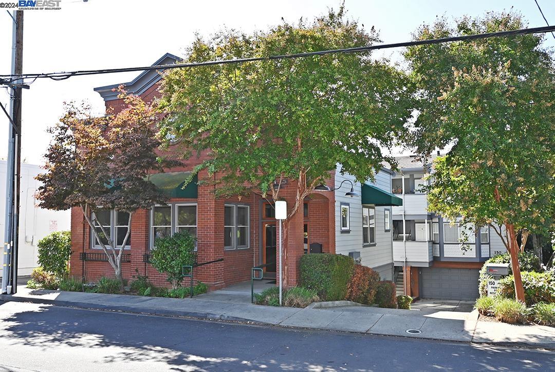 a view of a house with a street