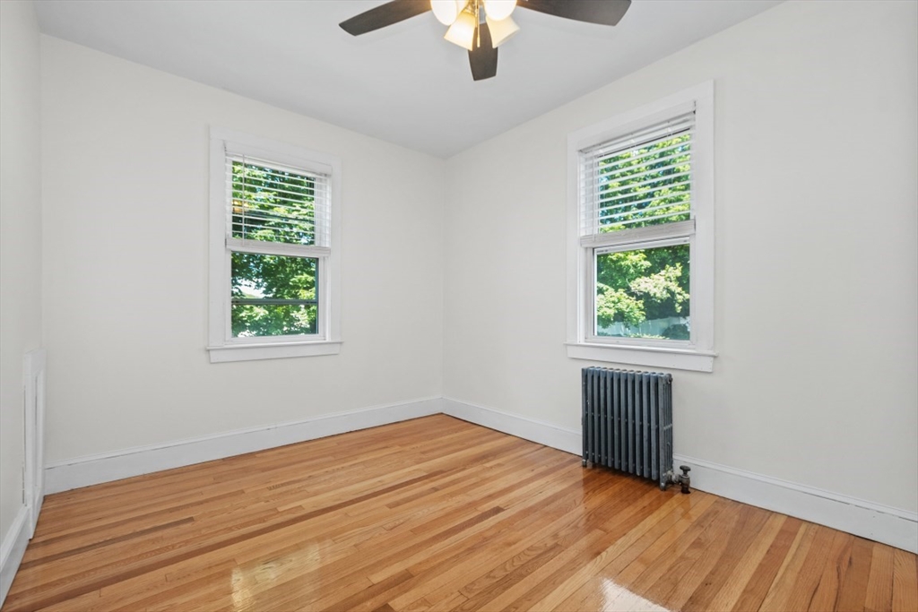 129 Virginia Road Waltham, MA 02453 - Photo 12 of 27 an empty room with a window