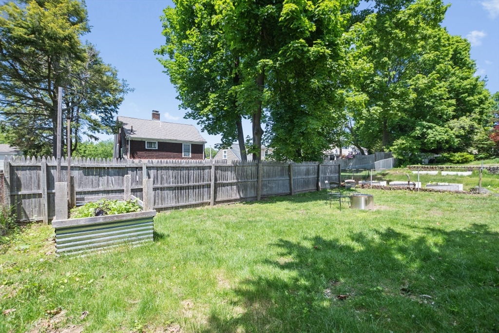129 Virginia Road Waltham, MA 02453 - Photo 27 of 27 a garden view with a seating space